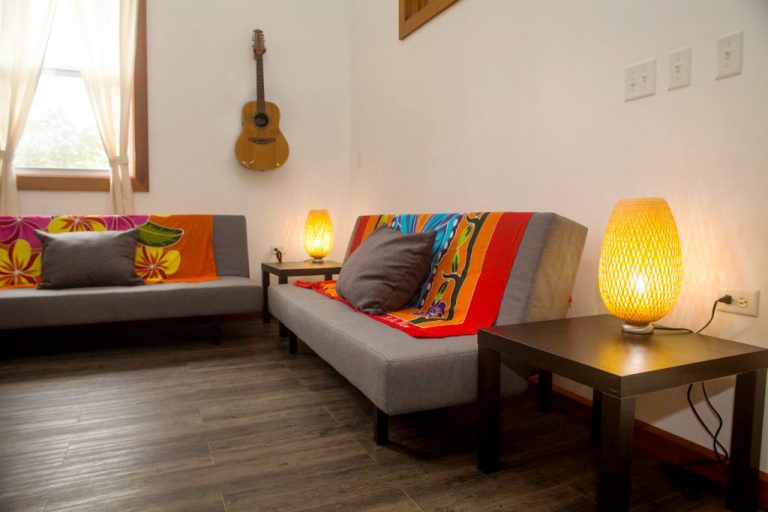 lounge seating area with guitar in bocas